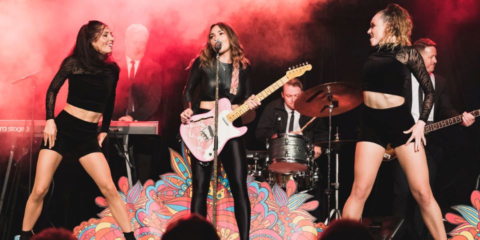 Women with electric guitar