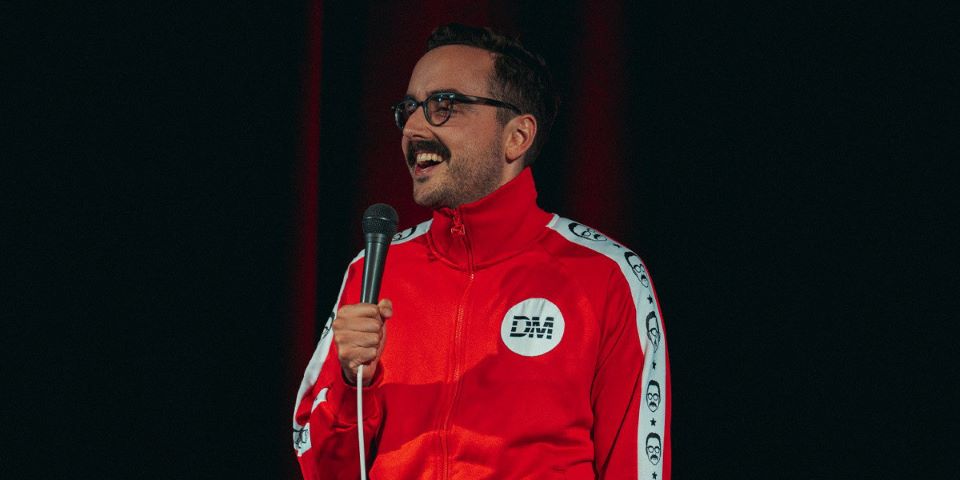 man in red tracksuit