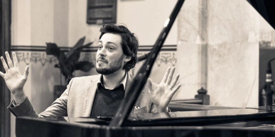 man at piano