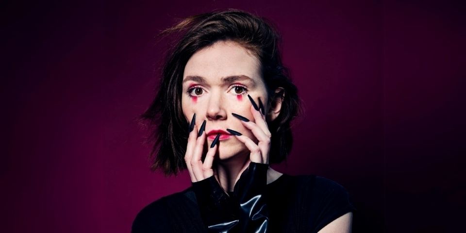 woman with black fingernails