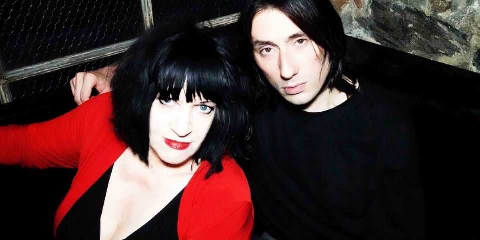 woman and man looking at camera