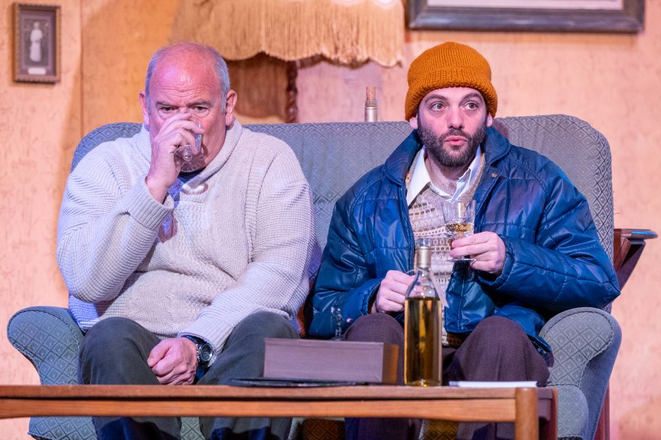two men on couch